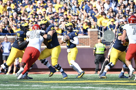 Myles Hinton (78), Zak Zinter (65), J.J. McCarthy (9), and Drake Nugent (60)