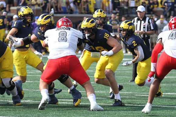 Roman Wilson (1), Colston Loveland (18), J.J. McCarthy (9), and Blake Corum (2)