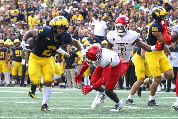 Blake Corum (2) and AJ Barner (89)