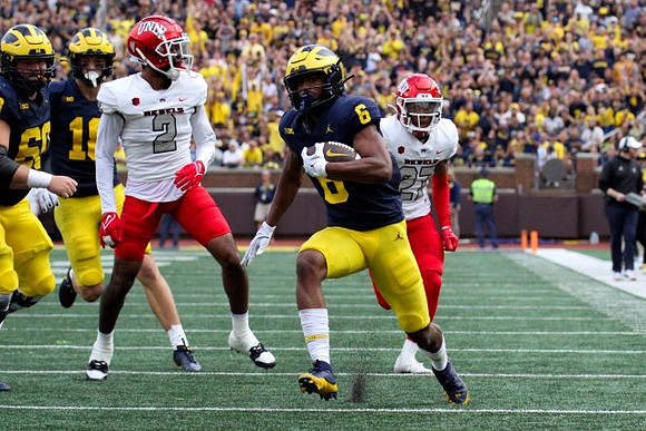 Drake Nugent (60), Colston Loveland (18), and Cornelius Johnson (6)