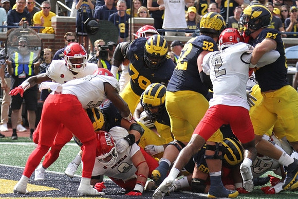 Myles Hinton (78), Blake Corum (2), and Karsen Barnhart (52)