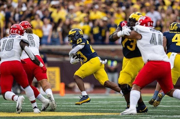 CJ Stokes (23), LaDarius Henderson (73), and Jayden Denegal (4)