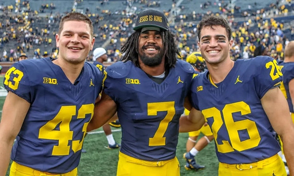 Jesse Madden (43), Donovan Edwards (7), and Jake Thaw (26)