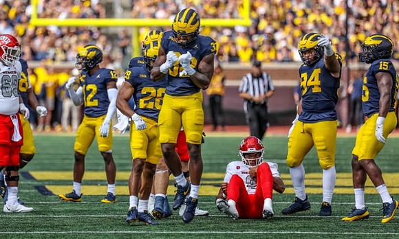 Josh Wallace (12), Quinten Johnson (28), Jaylen Harrell (32), Kris Jenkins (94), and Ernest Hausmann (15)