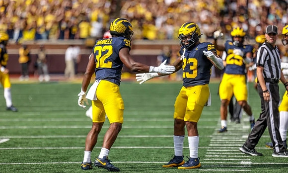 Jaylen Harrell (32), Michael Barrett (23), and Junior Colson (25)