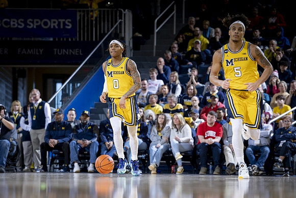 Dug McDaniel (0) and Terrance Williams II (5)