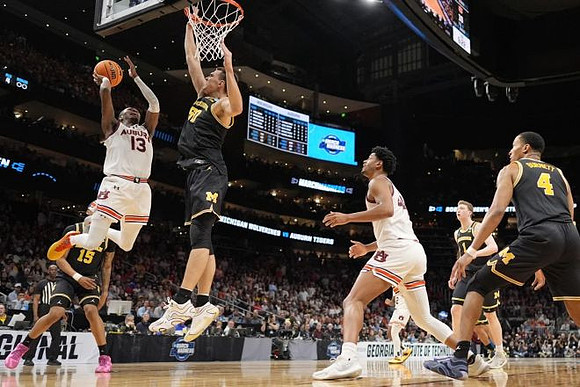 Rubin Jones (15), Vladislav Goldin (50), Danny Wolf (1), and Nimari Burnett (4)