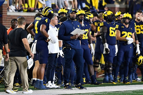 Sherrone Moore and Michigan Team