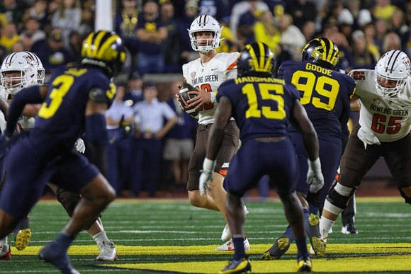 Keon Sabb (3), Ernest Hausmann (15), and Cam Goode (99)