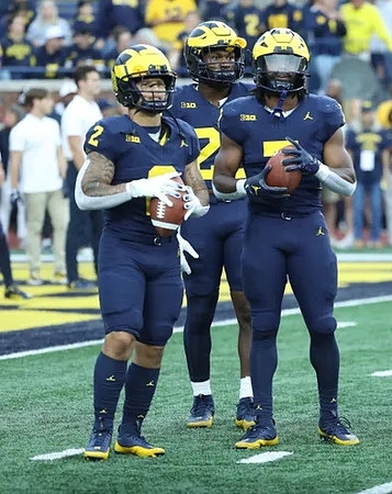 Blake Corum (2) and Donovan Edwards (7)