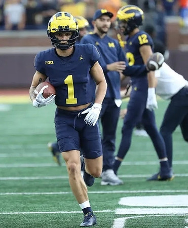 Roman Wilson (1) and Kendrick Bell (12)