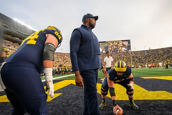 Sherrone Moore and Michigan Team