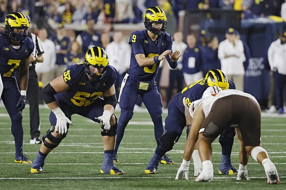 Donovan Edwards (7), Trente Jones (53), J.J. McCarthy (9), and Zak Zinter (65)