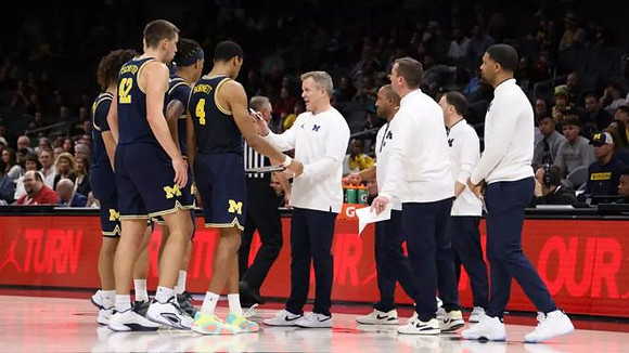 Dusty May and Michigan Team