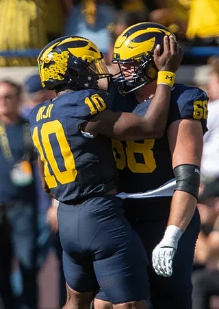 Alex Orji (10) and Josh Priebe (68)
