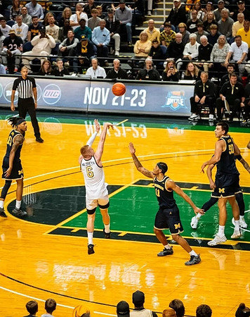 Rubin Jones (15), Roddy Gayle Jr. (11), and Vladislav Goldin (50)