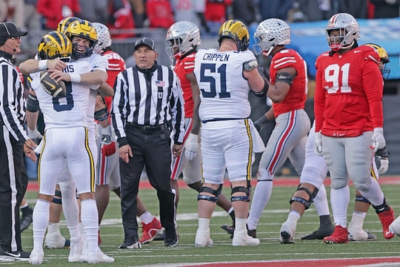 Tyler Morris (8), Davis Warren (16), and Greg Crippen (51)