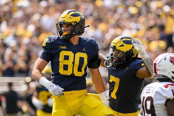Hogan Hansen (80) and Donovan Edwards (7)