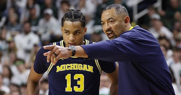 Jett Howard (13) and Juwan Howard