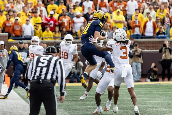 Davis Warren (16) and Peyton O'Leary (81)