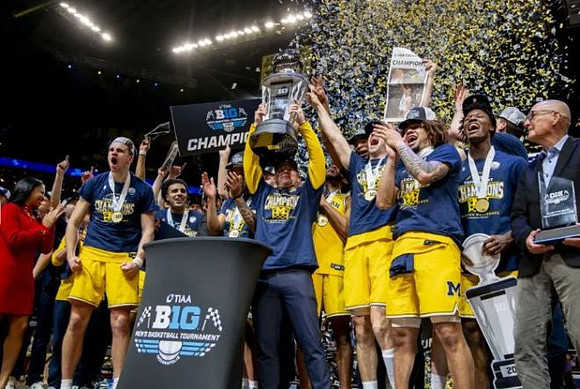 Dusty May, Michigan Team, and Big Ten Tournament Championship Trophy
