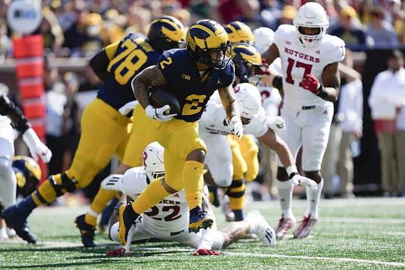 Myles Hinton (78) and Blake Corum (2)