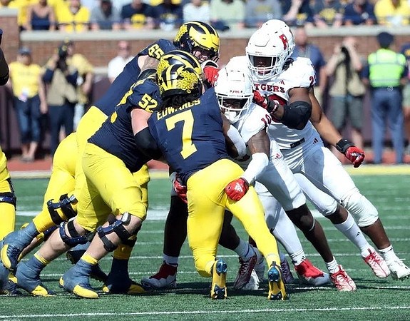 Zak Zinter (65), Karsen Barnhart (52), and Donovan Edwards (7)