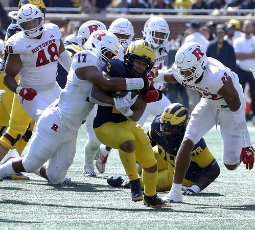 Blake Corum (2) and Myles Hinton (78)