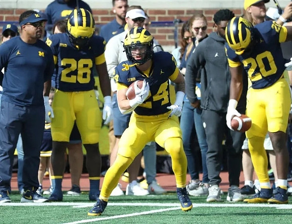 Mike Hart, Benjamin Hall (28), Cole Cabana (24), and Kalel Mullings (20)