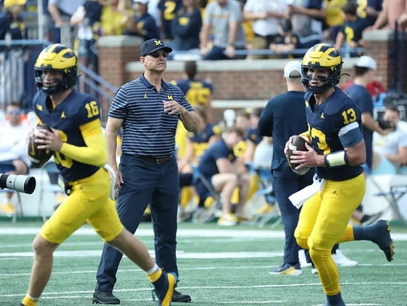 Davis Warren (16), Jim Harbaugh, and Jack Tuttle (13)