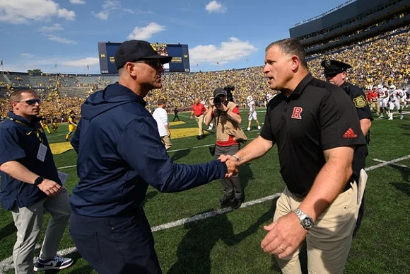 Jim Harbaugh and Rutgers Head Coach Greg Schiano