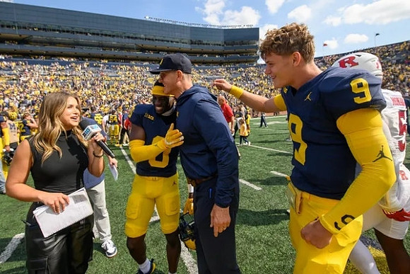 Mike Sainristil (0), Jim Harbaugh, and J.J. McCarthy (9)