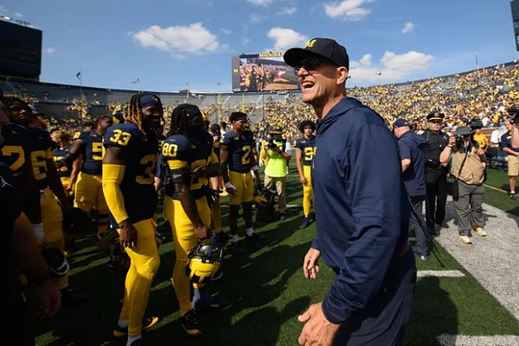 Jim Harbaugh and Michigan Team