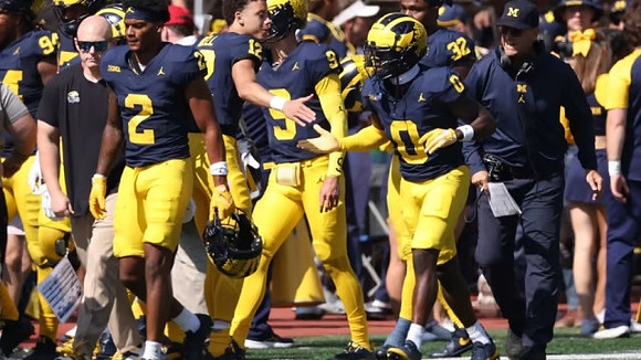Michigan Team and Jim Harbaugh