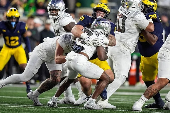 Aamir Hall (12), Mason Graham (55), and Kenneth Grant (78)