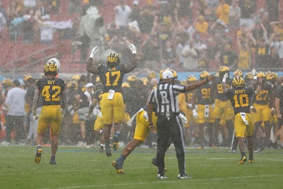 TJ Guy (42), Enow Etta (17), and Zeke Berry (10)