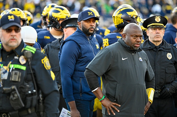 Sherrone Moore and Tony Alford