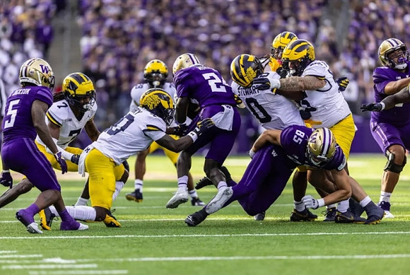 Makari Paige (7), Zeke Berry (10), Josaiah Stewart (0), and Mason Graham (55)