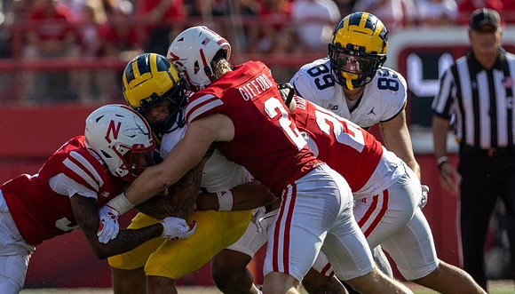 Blake Corum (2) and AJ Barner (89)