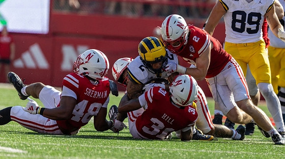 Blake Corum (2) and AJ Barner (89)