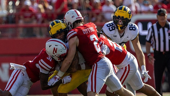 Blake Corum (2) and AJ Barner (89)