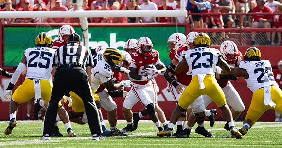 Junior Colson (25), Cam Goode (99), Michael Barrett (23), and Quinten Johnson (28)