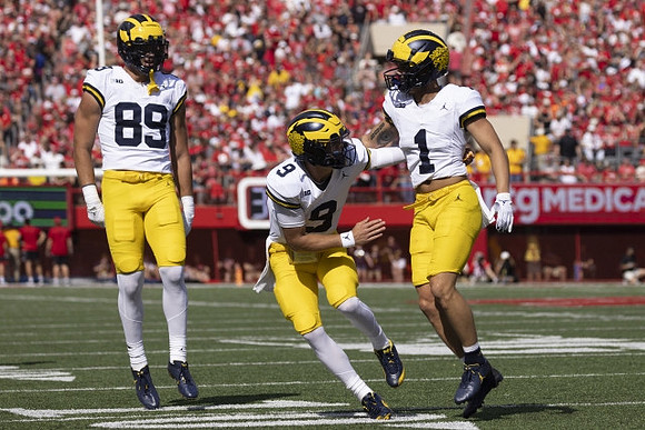 AJ Barner (89), J.J. McCarthy (9), and Roman Wilson (1)