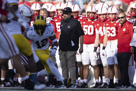 Josh Wallace (12) and Nebraska Head Coach Matt Rhule