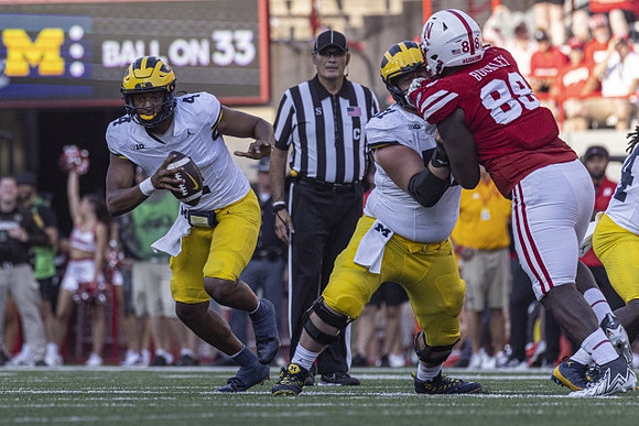 Jayden Denegal (4) and Greg Crippen (51)