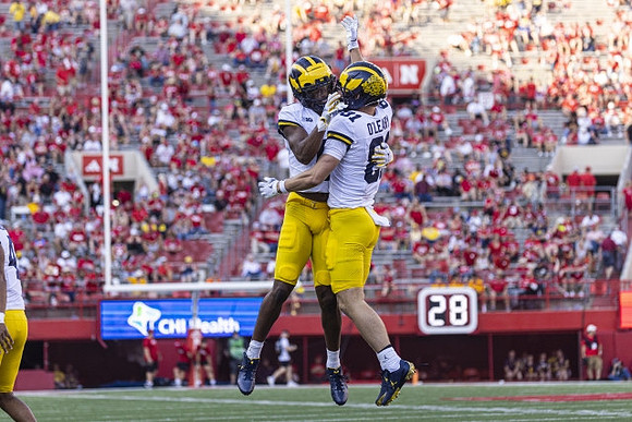 Jayden Denegal (4) and Peyton O'Leary (81)