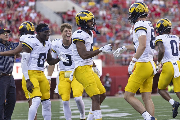 Mike Sainristil (0), J.J. McCarthy (9), Tyler Morris (8), Peyton O'Leary (81), and Darrius Clemons (0)