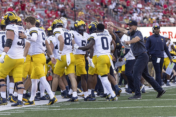 Jim Harbaugh and Michigan Team