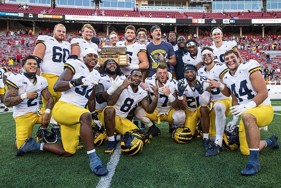 Michigan Team and Bussin' Bowl Trophy