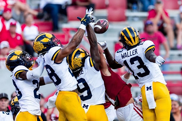 Jyaire Hill (20), Derrick Moore (8), Rod Moore (9), and DJ Waller Jr. (13)